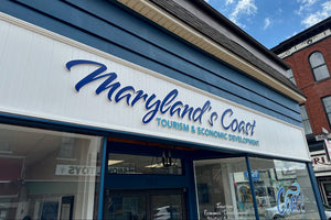 a photo of the Maryland's Coast tourism building with the lettering mounted above the entrance