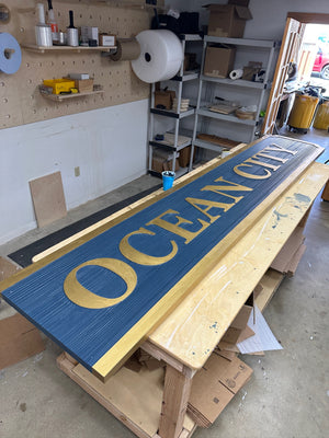 a photo of half of the Museum of Ocean City sign
