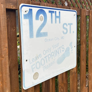 12th Street - Leave Only Your Footprints Sign