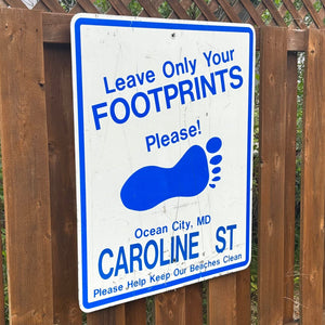 Caroline Street - Leave Only Your Footprints Sign