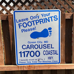 Carousel / 117th - Leave Only Your Footprints Sign