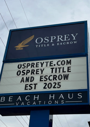 Outdoor sign for Osprey Title & Escrow with website and establishment year displayed.