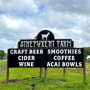 a photo of the Sinepuxent Farm sign