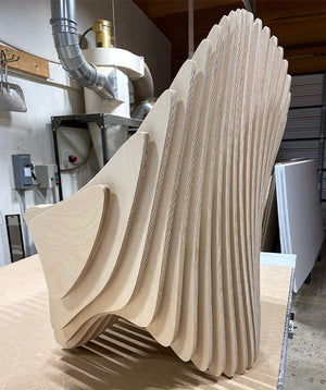 a photo of a strange looking abstract wooden chair