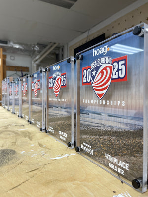 an angled photo of the 2025 USA Surfing Championship awards standing in a line