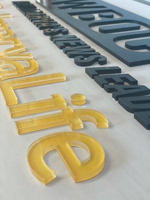an angled closeup of the WBOC DelmarvaLife sign showing the raised acrylic
