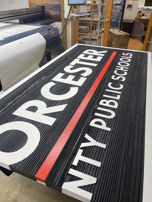 a photo of half of the WCPS Board of Education sign