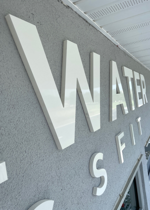 an angled closeup of the lettering for Whitewater Crossfit