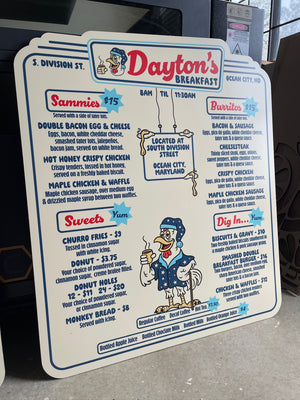 an angled photo of a menu sign for Dayton's restaurant with a white background, red headings and blue lettering