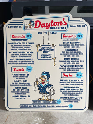 a photo of a menu sign for Dayton's restaurant with a white background, red headings and blue lettering