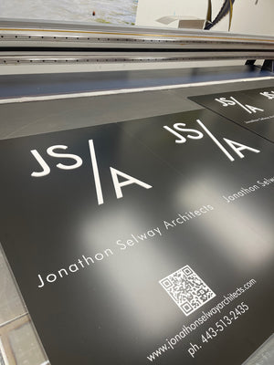 a photo of the Jonathon Selway signs on the printer
