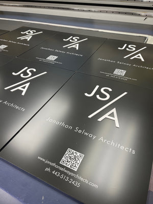 a photo of the Jonathon Selway signs on the printer